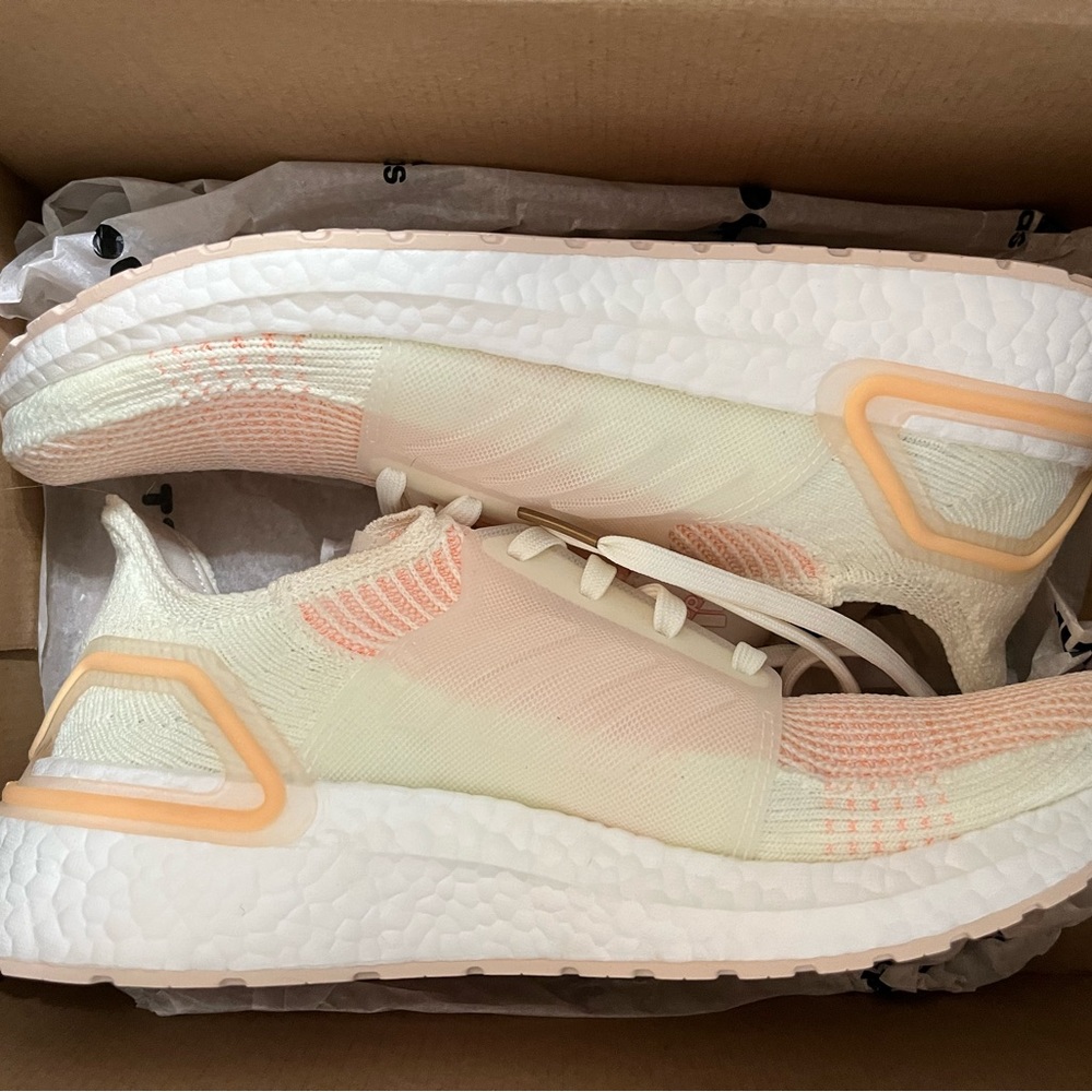 UltraBoost 19 'Glow Orange' in size women 10. Never worn brand new in box.